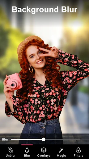 Background blur adjustment screen with portrait photo and slider control for blur intensity level customization