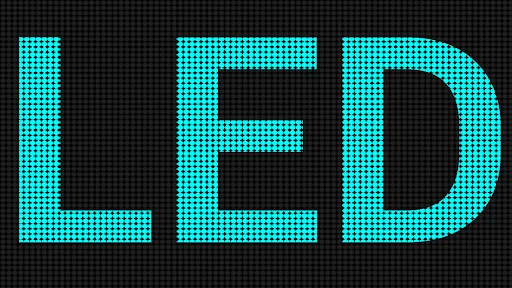 Cyan blue LED banner showing 'LED' text in bright neon style on dark pixelated grid display