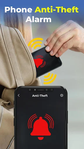 Phone Anti-Theft Alarm app protection interface with hand grabbing phone from beige bag triggering active anti-theft alarm bells