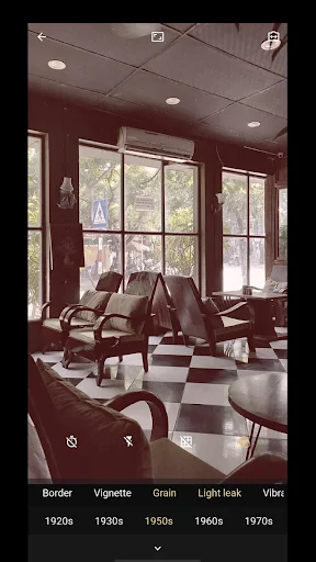 Office interior scene with warm sepia-red vintage filter applied for classic 8mm film aesthetic